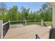 Spacious deck overlooking a vast green yard and a charming playhouse at 1490 N County Road 50 E, Danville, IN 46122