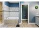 Stylish bathroom features a soaking tub with a tiled surround, a shower, and neutral paint at 1490 N County Road 50 E, Danville, IN 46122