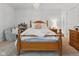 Bright bedroom features a light-colored wood bed frame and white walls and trim at 1490 N County Road 50 E, Danville, IN 46122