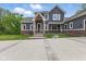Charming two-story home featuring brick accents and a spacious concrete driveway at 1490 N County Road 50 E, Danville, IN 46122
