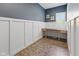 Office featuring wainscoting, blue walls, and a window for natural light at 1490 N County Road 50 E, Danville, IN 46122
