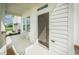 Charming front porch with a chair and a view of the well-maintained yard at 15792 Wiseman Dr, Fishers, IN 46040