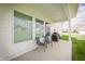 Relaxing covered patio with seating and a grill, perfect for outdoor dining at 15792 Wiseman Dr, Fishers, IN 46040
