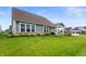 Well-manicured backyard with inviting patio and tidy landscaping provides an ideal outdoor retreat at 16270 Northwind Ct, Westfield, IN 46074
