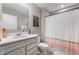 Elegant bathroom featuring a single sink vanity and a shower-tub combo, creating a spa-like space to relax at 16270 Northwind Ct, Westfield, IN 46074