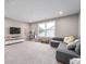 Bright and airy playroom with a comfy sectional couch, large window, and plenty of space for fun activities at 16270 Northwind Ct, Westfield, IN 46074