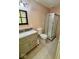 Bathroom featuring vanity with granite top, undermount sink, framed mirror, shower and toilet at 1639 Park Castle Way, Indianapolis, IN 46229