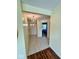 Hallway with tile flooring leading to various rooms, including a bedroom at 1639 Park Castle Way, Indianapolis, IN 46229