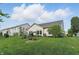 Expansive backyard with green lawn, offering plenty of space for recreation and leisure at 1663 Sweetgum Dr, Greenwood, IN 46143