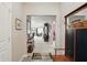 Inviting foyer with decor and wooden bench, leading into a spacious living area at 1663 Sweetgum Dr, Greenwood, IN 46143