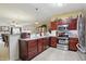 Efficient kitchen featuring stainless steel appliances and seamless connectivity to the open living spaces at 1663 Sweetgum Dr, Greenwood, IN 46143