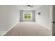 Large bedroom with neutral carpet and paint, equipped with a ceiling fan and TV mount for easy entertainment at 16739 Cattle Hollow Ln, Noblesville, IN 46060