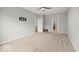 Bright bedroom with neutral walls and carpet, perfect for personalization, offers access to bathroom and walk-in closet at 16739 Cattle Hollow Ln, Noblesville, IN 46060