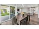 Cozy dining area adjacent to the kitchen with a table set for four and natural light at 16739 Cattle Hollow Ln, Noblesville, IN 46060