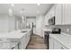 Bright kitchen featuring white cabinetry, subway tile backsplash, and stainless steel appliances at 16739 Cattle Hollow Ln, Noblesville, IN 46060