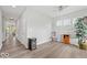 Open floor plan living room with modern flooring and lots of natural light at 16739 Cattle Hollow Ln, Noblesville, IN 46060