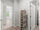 Well-organized walk-in closet with built-in shelving, providing ample storage space for clothing and accessories at 16739 Cattle Hollow Ln, Noblesville, IN 46060