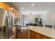 Kitchen features stainless appliances, plenty of cabinet storage and counter space, and views to the dining area at 1783 Trillium Ct, Avon, IN 46123