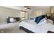 Spacious bedroom with neutral carpet, ample closet space, and an attached sitting area at 1783 Trillium Ct, Avon, IN 46123