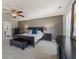 Serene main bedroom features ceiling fan, large bed, and neutral decor at 1783 Trillium Ct, Avon, IN 46123