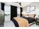 This bedroom features a large window, black-out curtains, and stylish decor at 18763 Moray St, Westfield, IN 46074