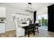 Bright dining area featuring curated collections and a sliding glass door to the outside at 18763 Moray St, Westfield, IN 46074