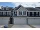 Charming townhome featuring an attached garage and inviting curb appeal at 18763 Moray St, Westfield, IN 46074