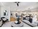 Open-concept living space featuring kitchen, dining, and living areas with modern decor at 18763 Moray St, Westfield, IN 46074