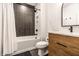 Modern bathroom with sleek vanity, stylish fixtures, and a relaxing bathtub/shower combo with elegant tiling at 2036 Central Ave, Indianapolis, IN 46202