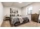 Cozy bedroom with comfortable queen-sized bed, stylish furniture, and ample natural light, creating a relaxing retreat at 2036 Central Ave, Indianapolis, IN 46202