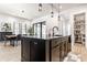 Spacious kitchen island, adjacent dining, open pantry and modern appliances at 2036 Central Ave, Indianapolis, IN 46202