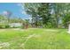 Spacious backyard with a playground, perfect for outdoor activities and relaxation at 212 W Banta Rd, Indianapolis, IN 46217