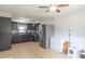 Kitchen features stainless steel refrigerator, gray cabinets, and a breakfast bar area at 212 W Banta Rd, Indianapolis, IN 46217