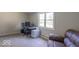 Living Room with neutral walls, carpet, and a window with lots of natural light at 212 W Banta Rd, Indianapolis, IN 46217