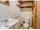 Small bathroom featuring a toilet and sink at 2221 Station St, Indianapolis, IN 46218
