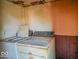 Close-up of a laundry room showing the washer and dryer appliances needing repairs at 2221 Station St, Indianapolis, IN 46218