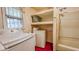 Laundry room and bathroom combination at 2221 Station St, Indianapolis, IN 46218