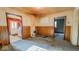 Cozy living room with wood paneling and natural light at 2221 Station St, Indianapolis, IN 46218