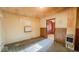 Cozy living room with wood paneling and natural light at 2221 Station St, Indianapolis, IN 46218