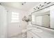 Bright bathroom with tile flooring, vanity, large mirror and decorative accents at 2319 E 40Th St, Anderson, IN 46013