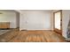 Hardwood floors in this living room with light-colored walls and ample light at 2319 E 40Th St, Anderson, IN 46013