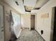 Shows a bedroom requiring significant repair and renovation, ideal for a restoration project at 2337 N Webster N Ave, Indianapolis, IN 46219