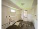 Depicts a kitchen in need of renovation, showcasing its potential for a modern remodel at 2337 N Webster N Ave, Indianapolis, IN 46219