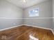 Inviting bedroom with hardwood floors and natural light at 2399 E Mckay Rd, Shelbyville, IN 46176