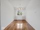 Charming dining room featuring hardwood floors and a chandelier at 2399 E Mckay Rd, Shelbyville, IN 46176