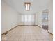 Bright dining room featuring tile floors and view to the backyard through the window at 2399 E Mckay Rd, Shelbyville, IN 46176