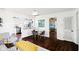 Spacious open floor plan, with stylish seating area, dining area, and view to kitchen at 253 E Minnesota St, Indianapolis, IN 46225
