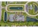 Stunning aerial view of a community with well-maintained landscaping and multiple ponds at 2726 Reflection Way, Greenwood, IN 46143