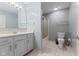 Bathroom featuring tile flooring, tub with shower, and vanity with storage at 2726 Reflection Way, Greenwood, IN 46143