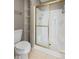 Shower and toilet within updated primary bathroom at 2726 Reflection Way, Greenwood, IN 46143